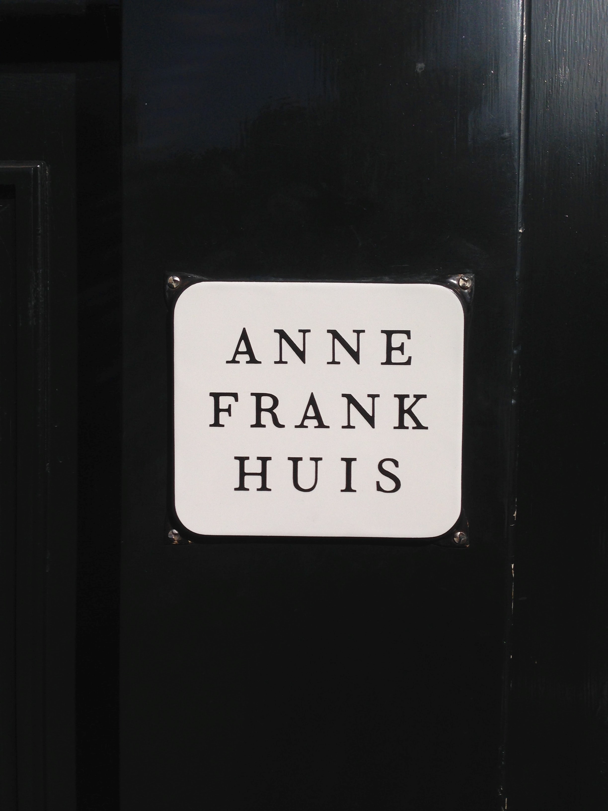 a plack on the door of Anne-Frank-House (Anne-Frankhuis) in Amsterdam, the Netherlands