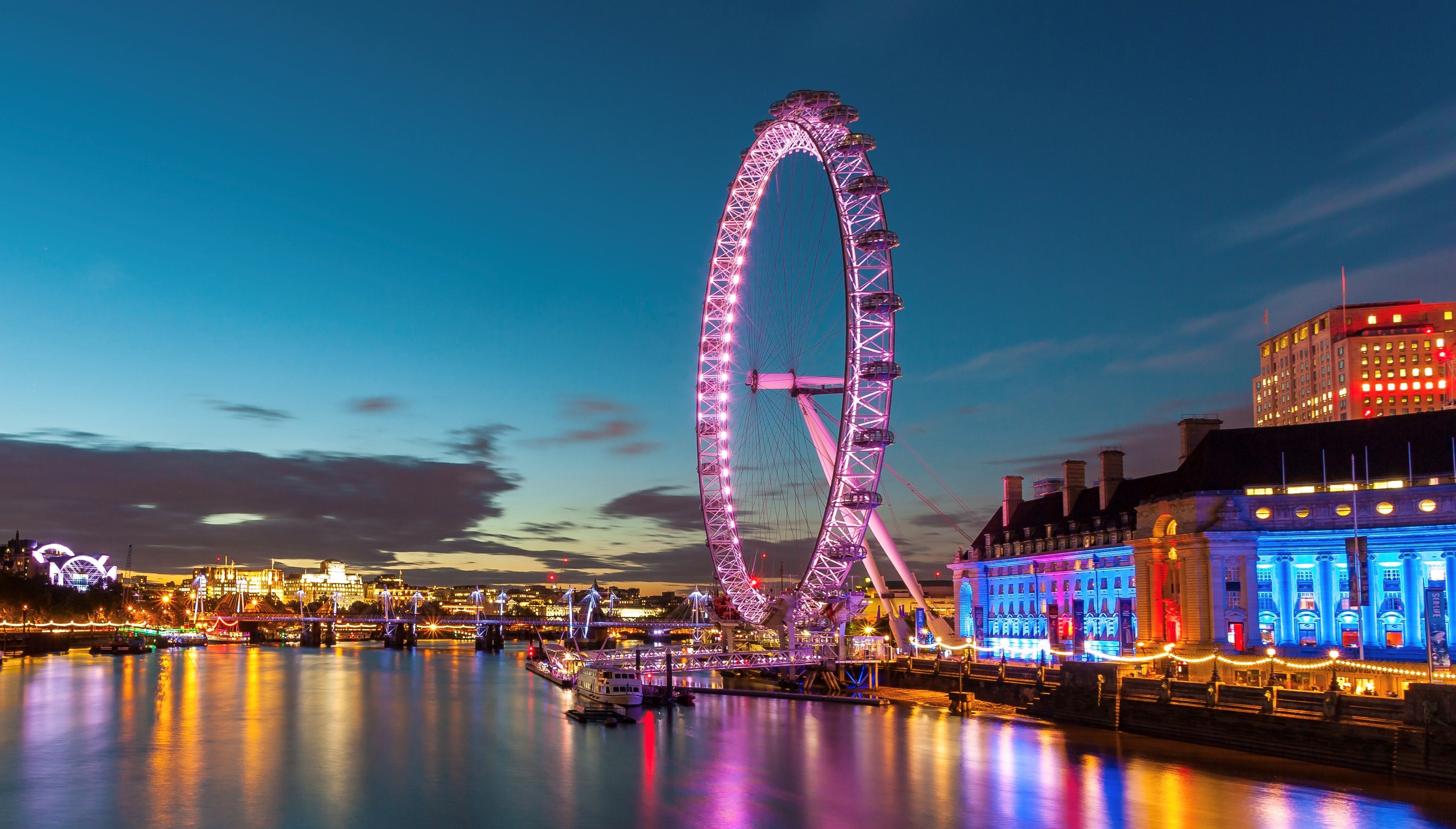 London Eye at night with reflections