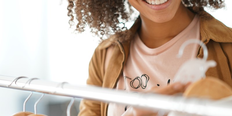 woman shopping in clothing store